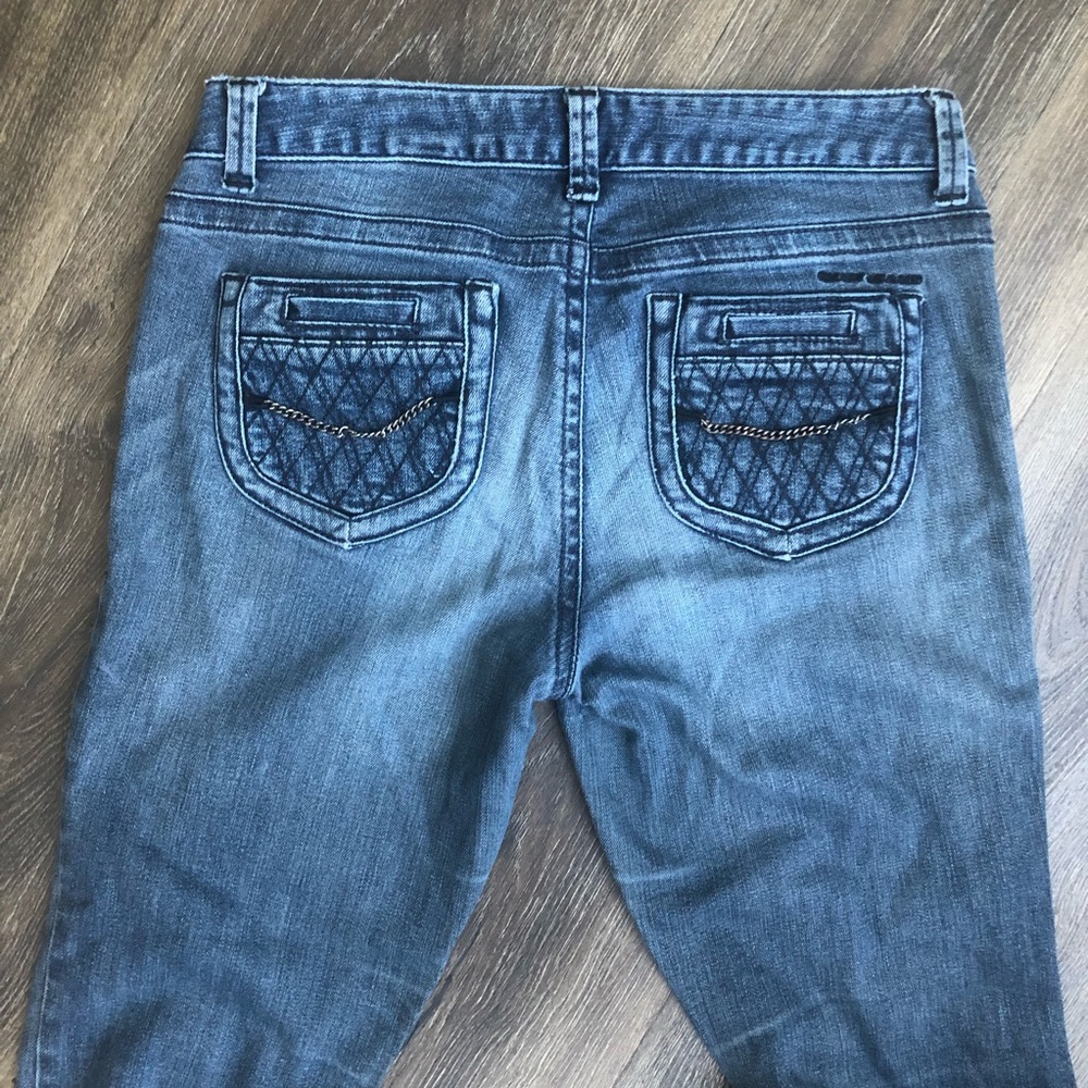 DKNY perfect for jeans with decorative pockets and chains.